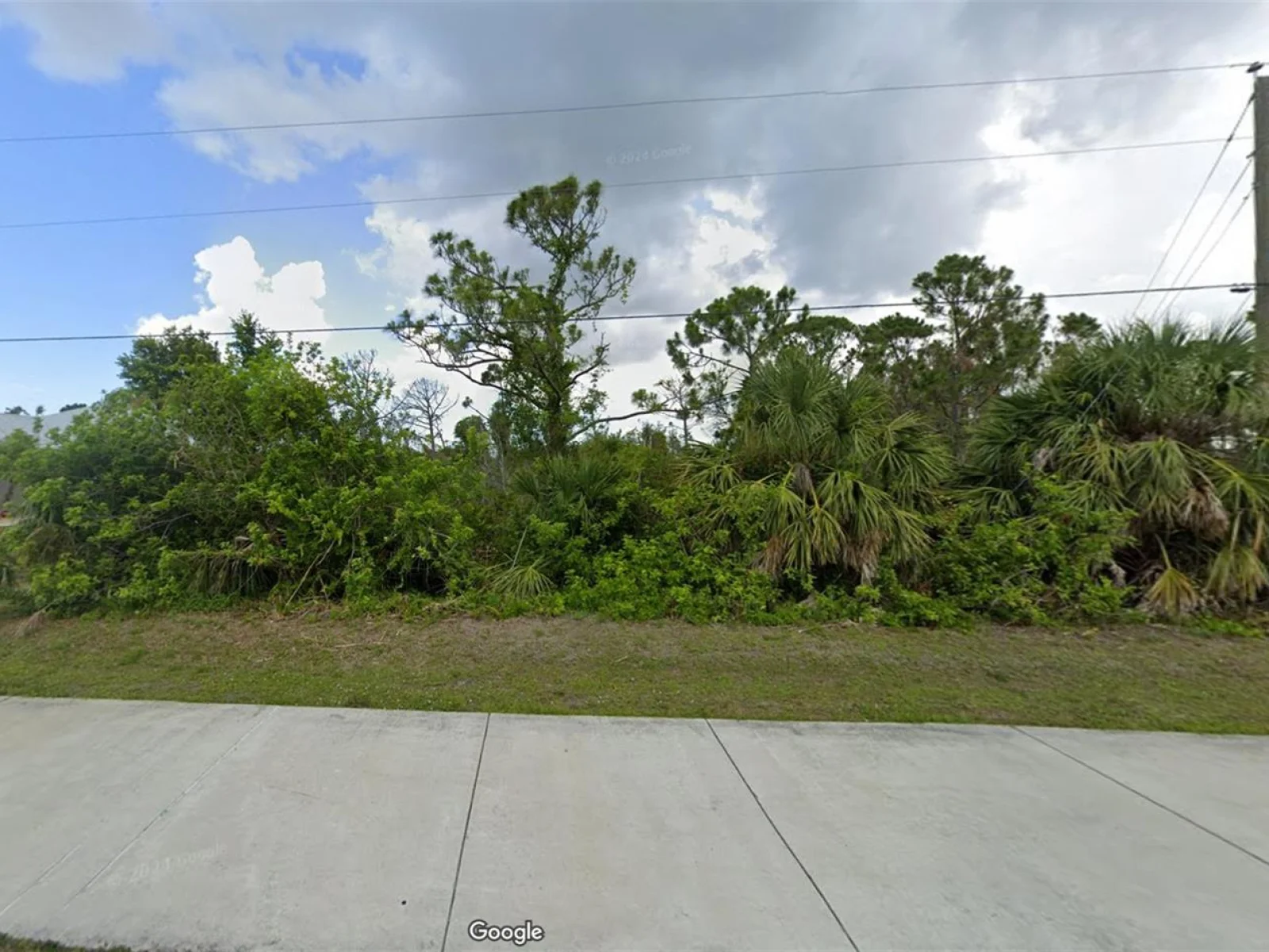 9387 HALLENDALE DR, PORT CHARLOTTE, FL — photo 2