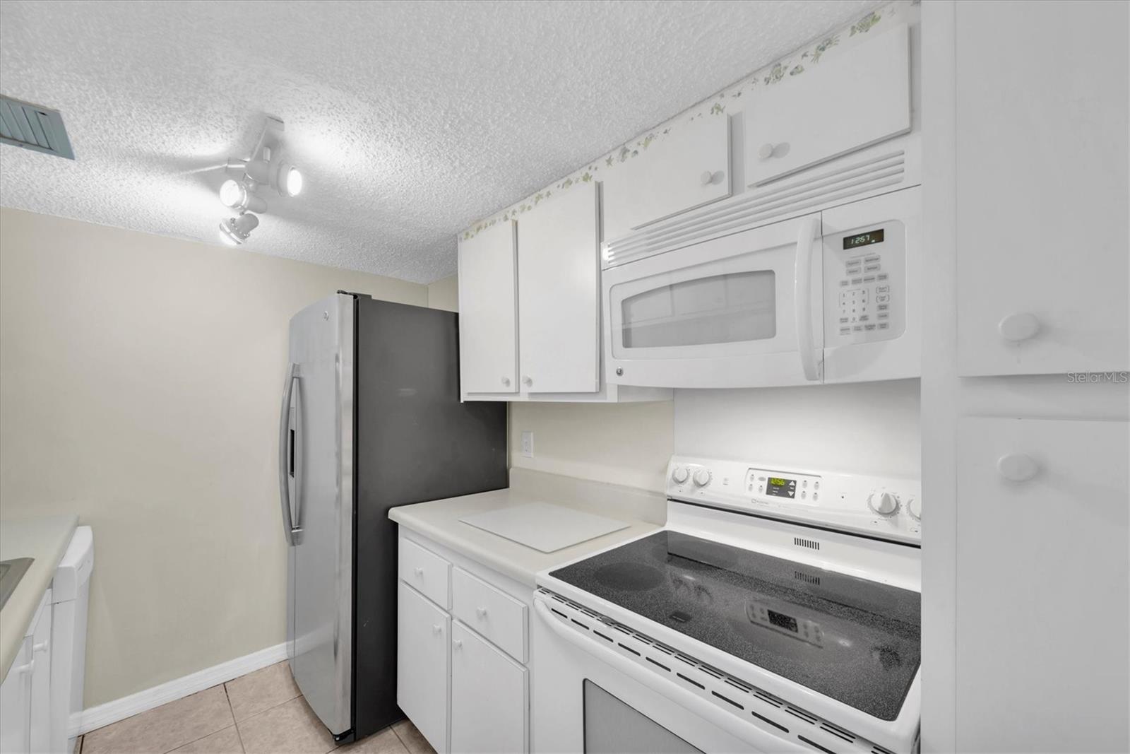 171 MEDALLION BLVD #F, MADEIRA BEACH, FL — photo 10