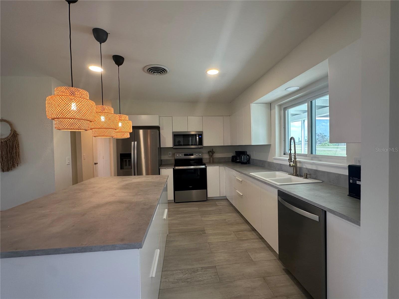 65 OAKLAND HILLS PL, ROTONDA WEST, FL — photo 13
