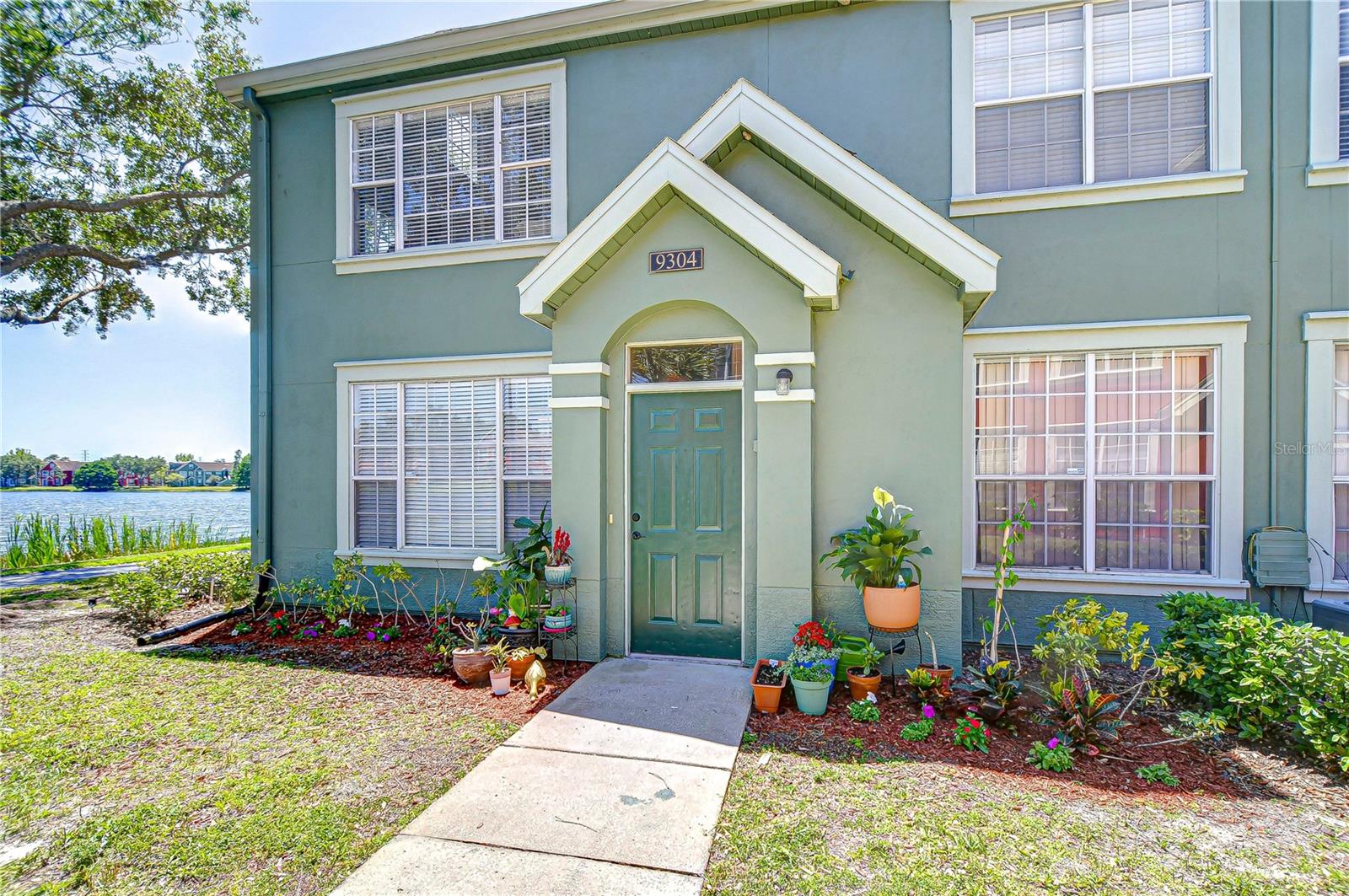 9304 LAKE CHASE ISLAND WAY, TAMPA, FL
