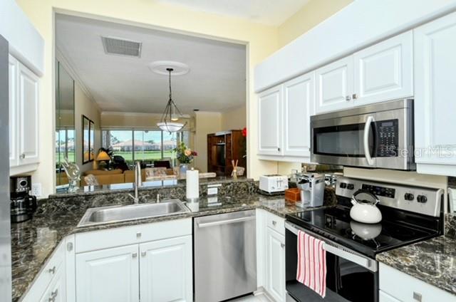 9480 FOREST HILLS CIR, SARASOTA, FL — photo 7