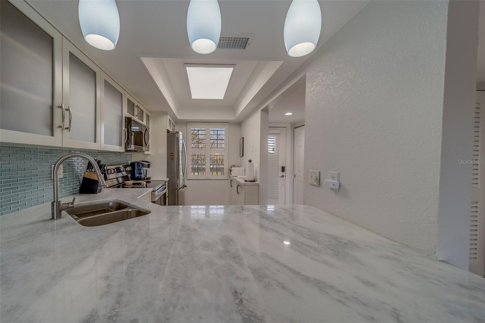 11650 CAPRI CIR S #105, TREASURE ISLAND, FL — photo 13