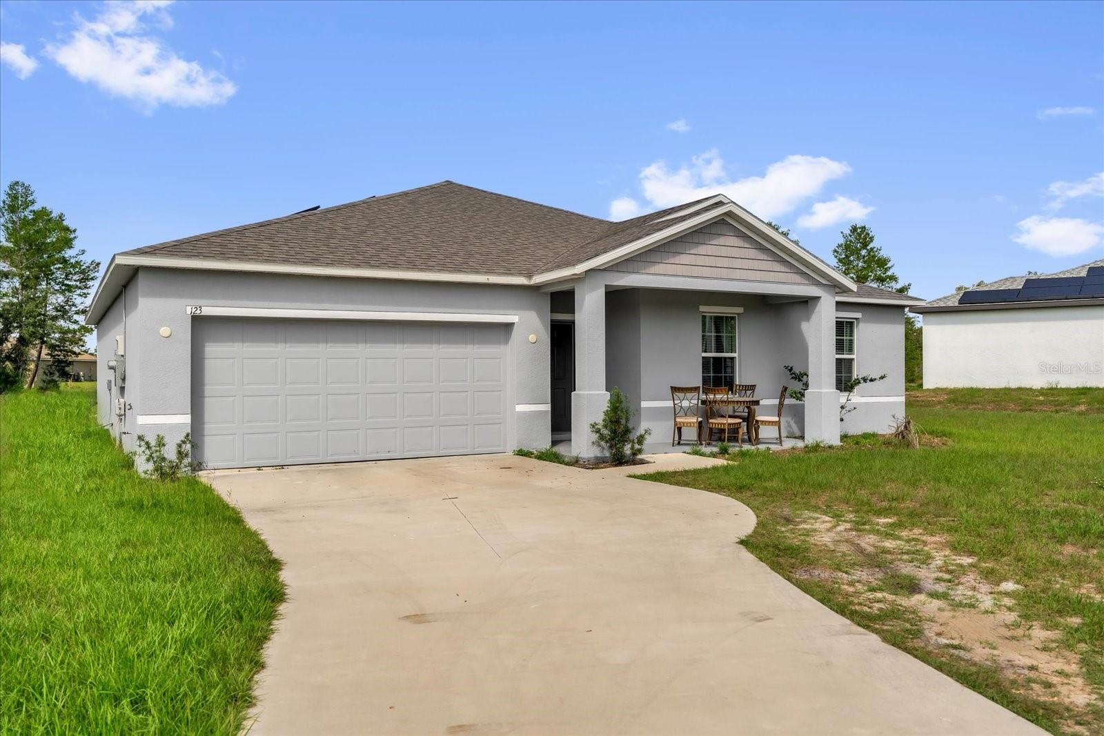 123 ZINNIA LN W, POINCIANA, FL — photo 2