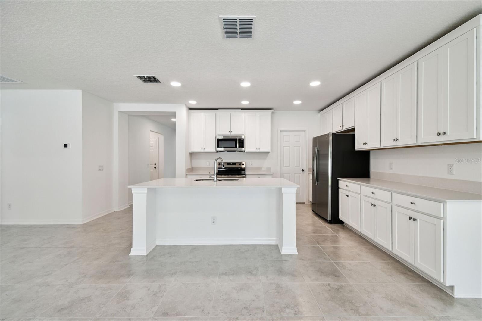 12801 CASTLE OAKS DR, HUDSON, FL — photo 10