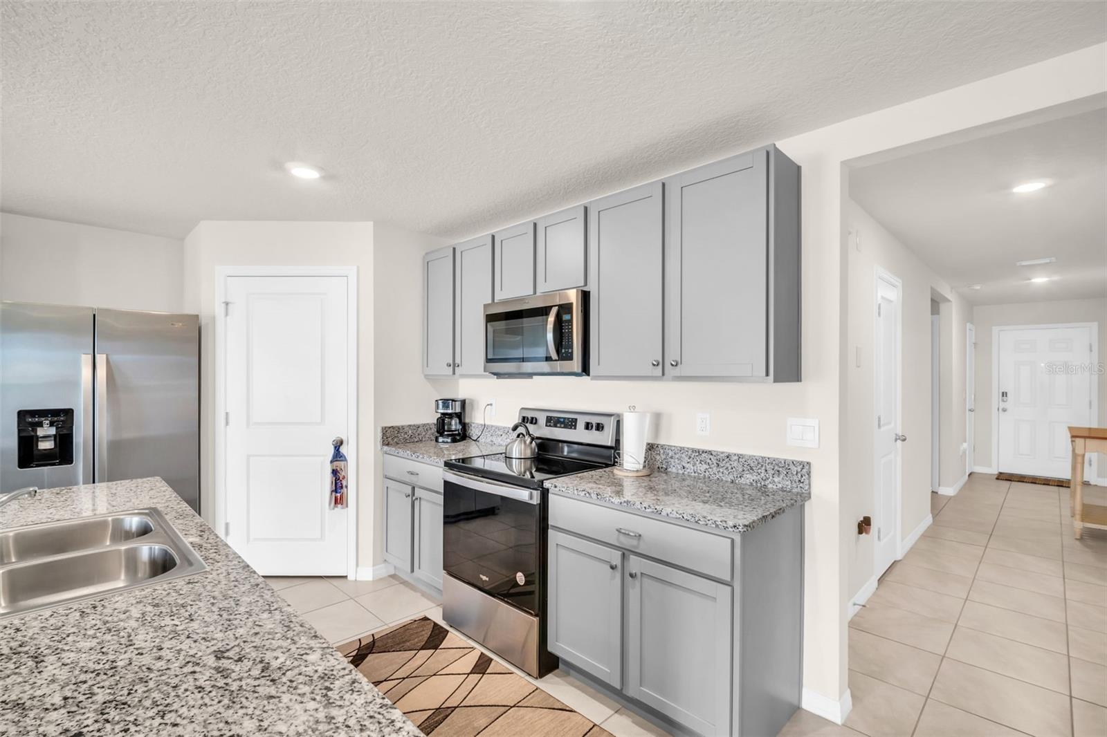 7774 SAIL CLOVER LN, ZEPHYRHILLS, FL — photo 3