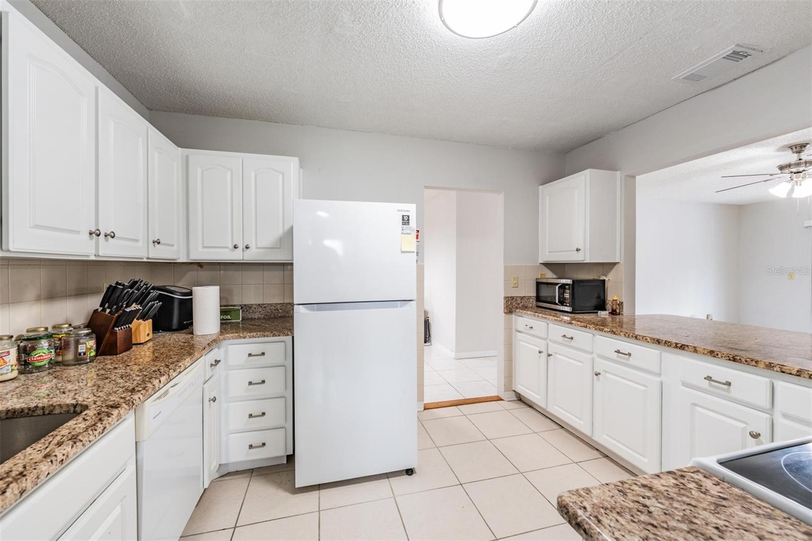1209 WILD FEATHER LN, SUN CITY CENTER, FL — photo 12