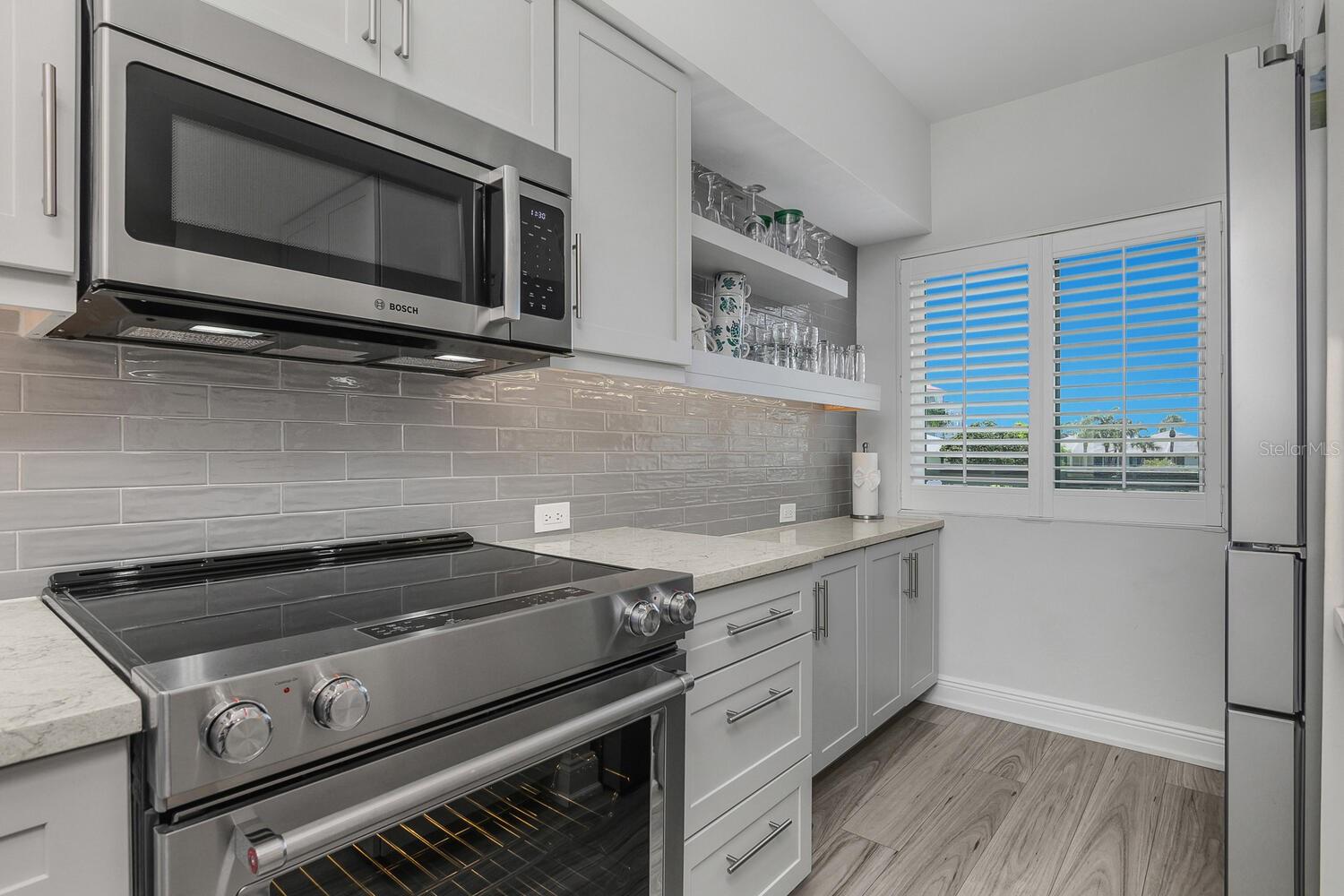 730 W ELKCAM CIR #302, MARCO ISLAND, FL — photo 11