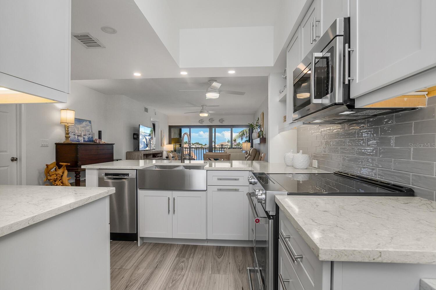 730 W ELKCAM CIR #302, MARCO ISLAND, FL — photo 13