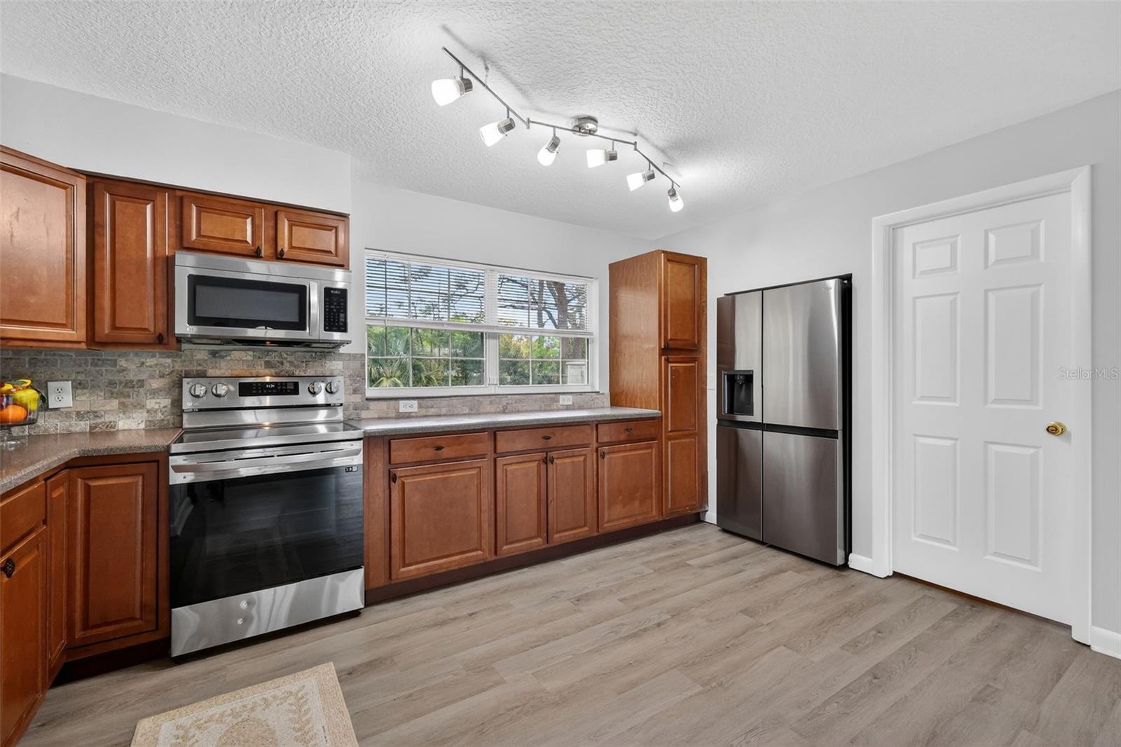 705 MIKE AVE, FRUITLAND PARK, FL — photo 15