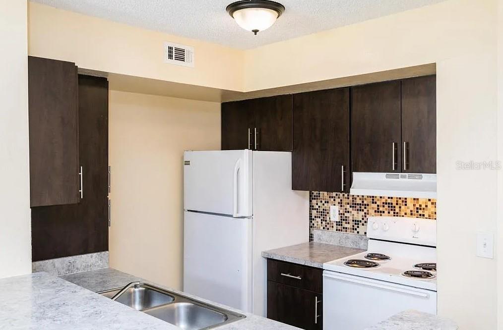 409 FOUNTAINHEAD CIR, KISSIMMEE, FL — photo 10