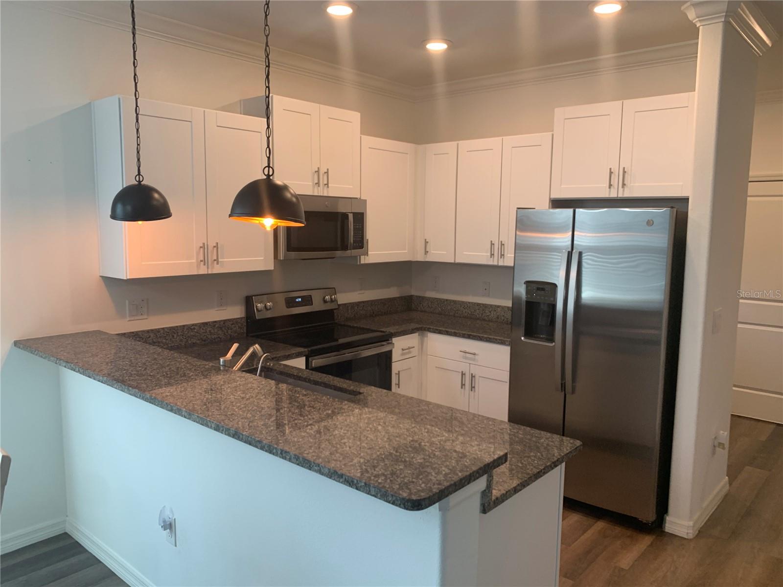 6930 RIPPLE POND LOOP, ZEPHYRHILLS, FL — photo 10