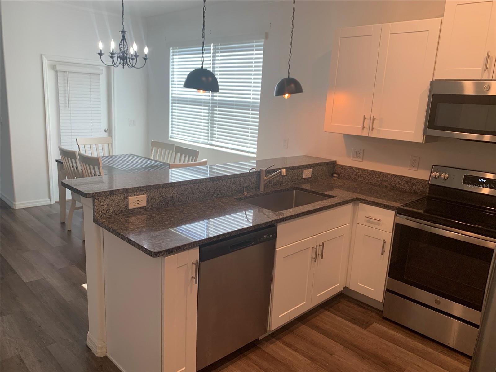 6930 RIPPLE POND LOOP, ZEPHYRHILLS, FL — photo 13