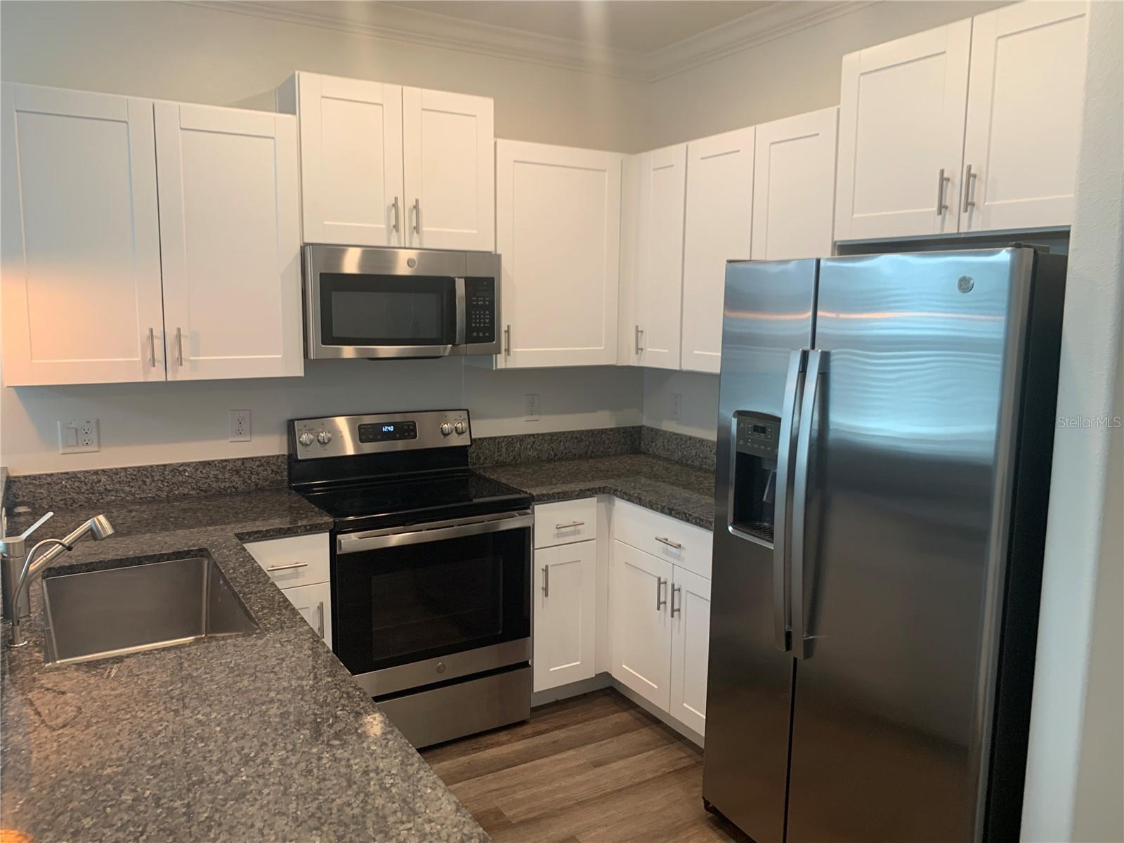 6930 RIPPLE POND LOOP, ZEPHYRHILLS, FL — photo 14