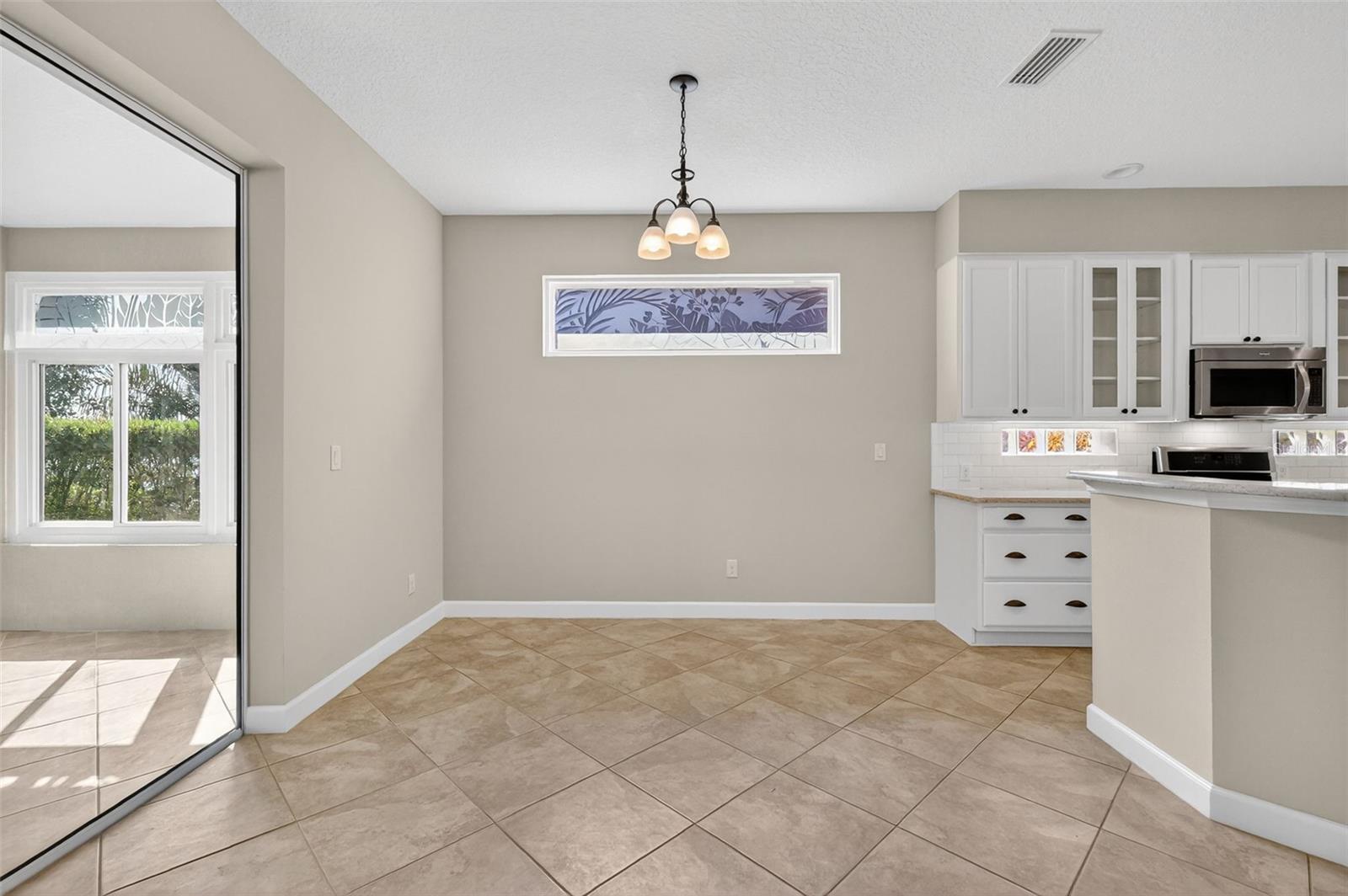 8852 BRIDGEPORT BAY CIR, MOUNT DORA, FL — photo 27