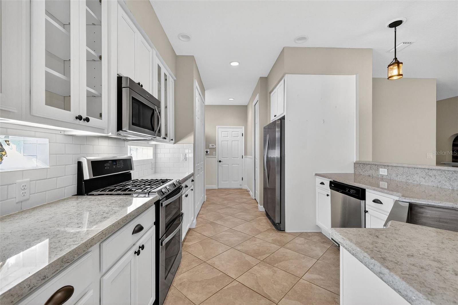 8852 BRIDGEPORT BAY CIR, MOUNT DORA, FL — photo 34
