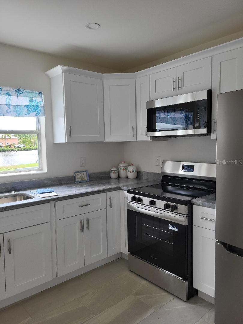 828 BLUE HERON BLVD, RUSKIN, FL — photo 11