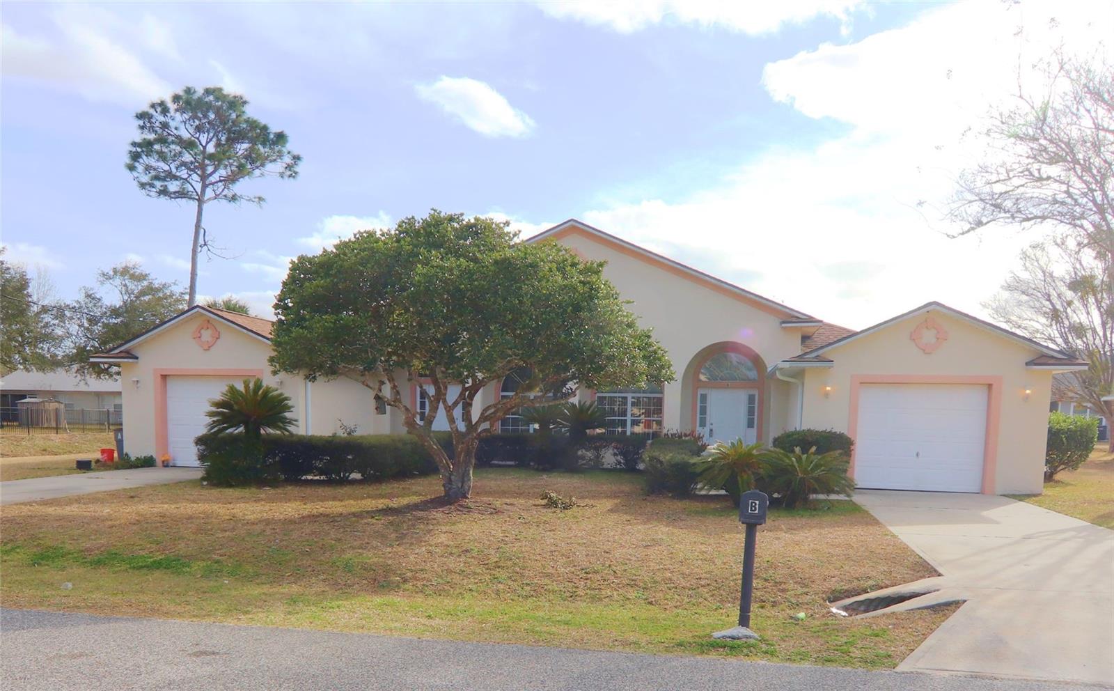 13 BUTTONWOOD LN, PALM COAST, FL