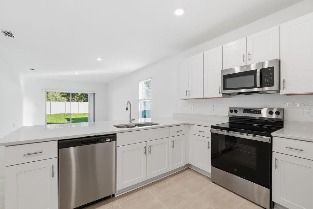 13502 TROPICAL BREEZE WAY, HUDSON, FL — photo 6