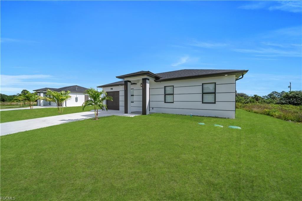 713 ROMA AVE S, LEHIGH ACRES, FL — photo 2