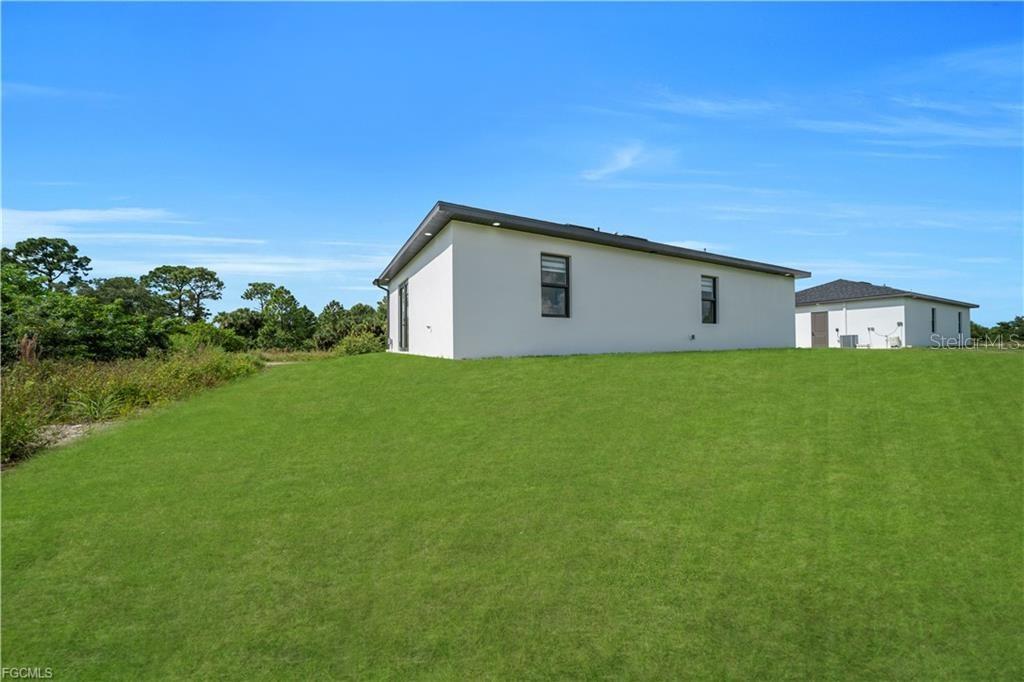 713 ROMA AVE S, LEHIGH ACRES, FL — photo 26
