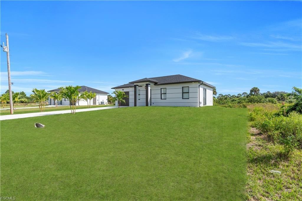 713 ROMA AVE S, LEHIGH ACRES, FL — photo 27