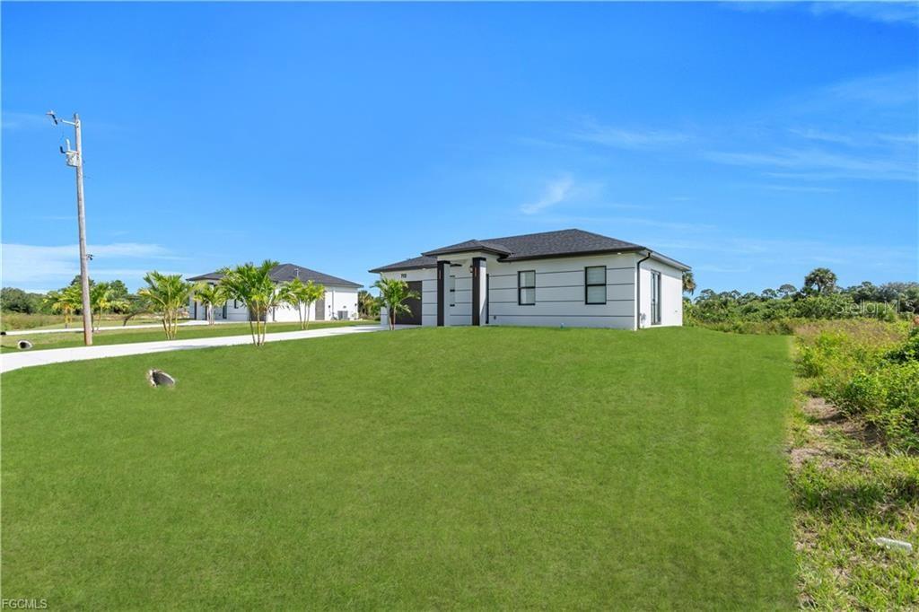 713 ROMA AVE S, LEHIGH ACRES, FL — photo 28