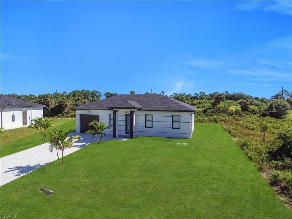 713 ROMA AVE S, LEHIGH ACRES, FL — photo 29