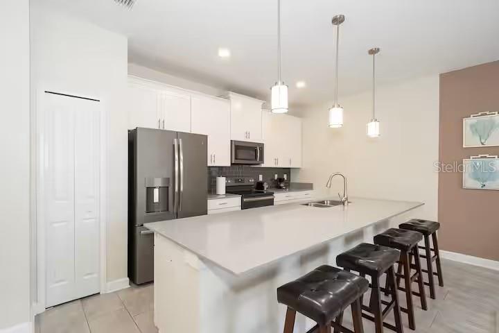 4905 WINDERMERE AVE, KISSIMMEE, FL — photo 6