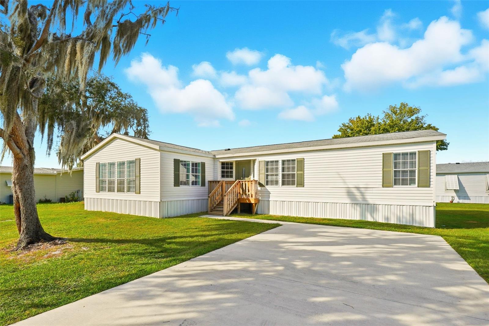 5180 LEXINGTON CIR, WILDWOOD, FL — photo 65