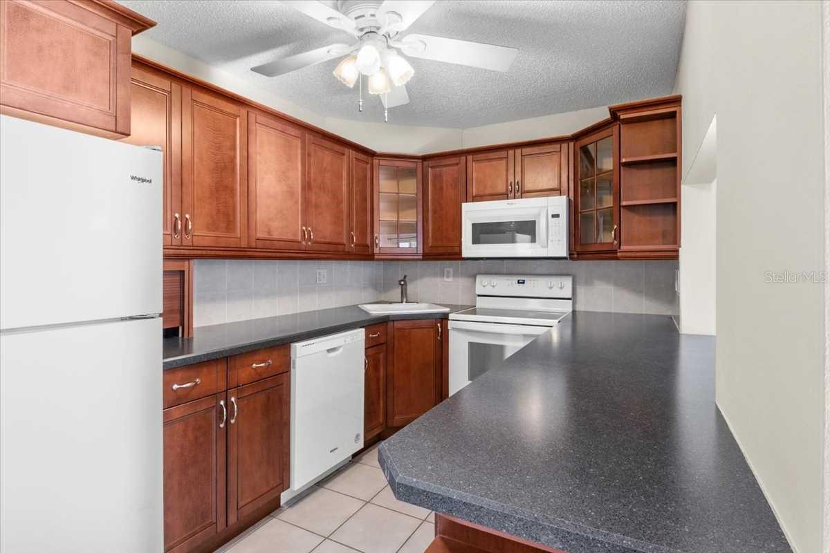 1127 PINE RIDGE CIR W #A2, TARPON SPRINGS, FL — photo 5