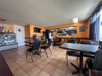 9852 E COLONIAL DR — photo 2