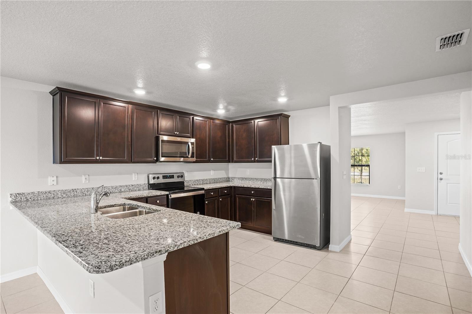 1621 ORNE ST, MASCOTTE, FL — photo 20