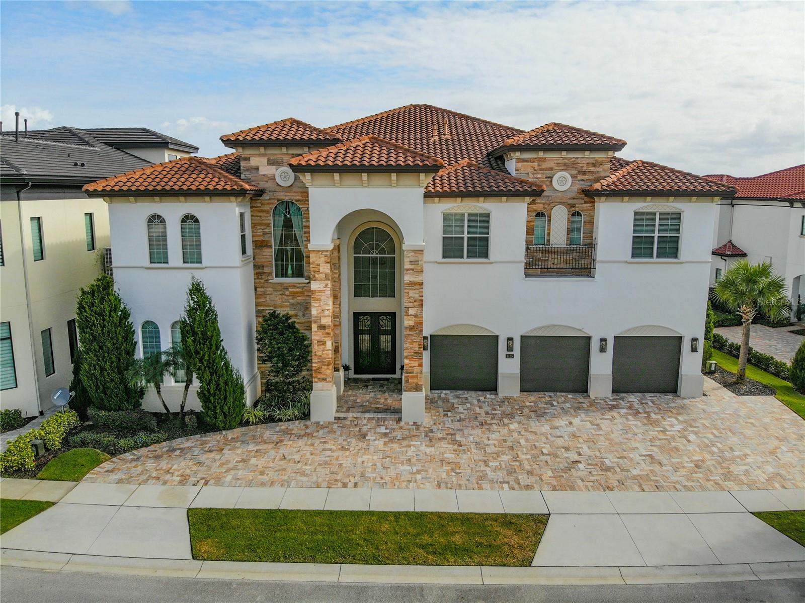 8029 TWIN EAGLES LOOP, REUNION, FL — photo 11