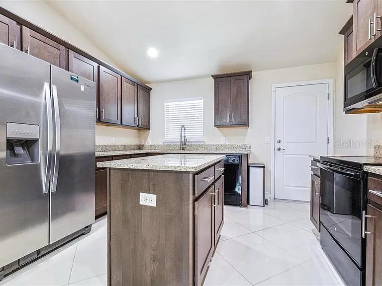 404 RIO GRANDE CT, POINCIANA, FL — photo 7