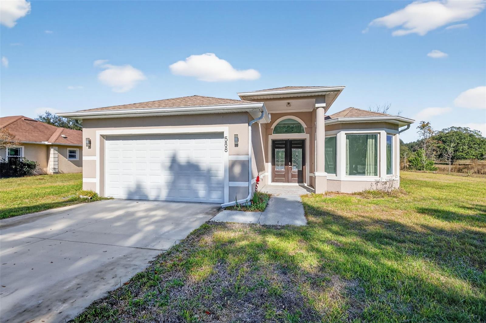 588 DOWLING CIR, LADY LAKE, FL — photo 25