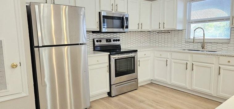 4387 JACKSON ST #J-E, PORT CHARLOTTE, FL — photo 13