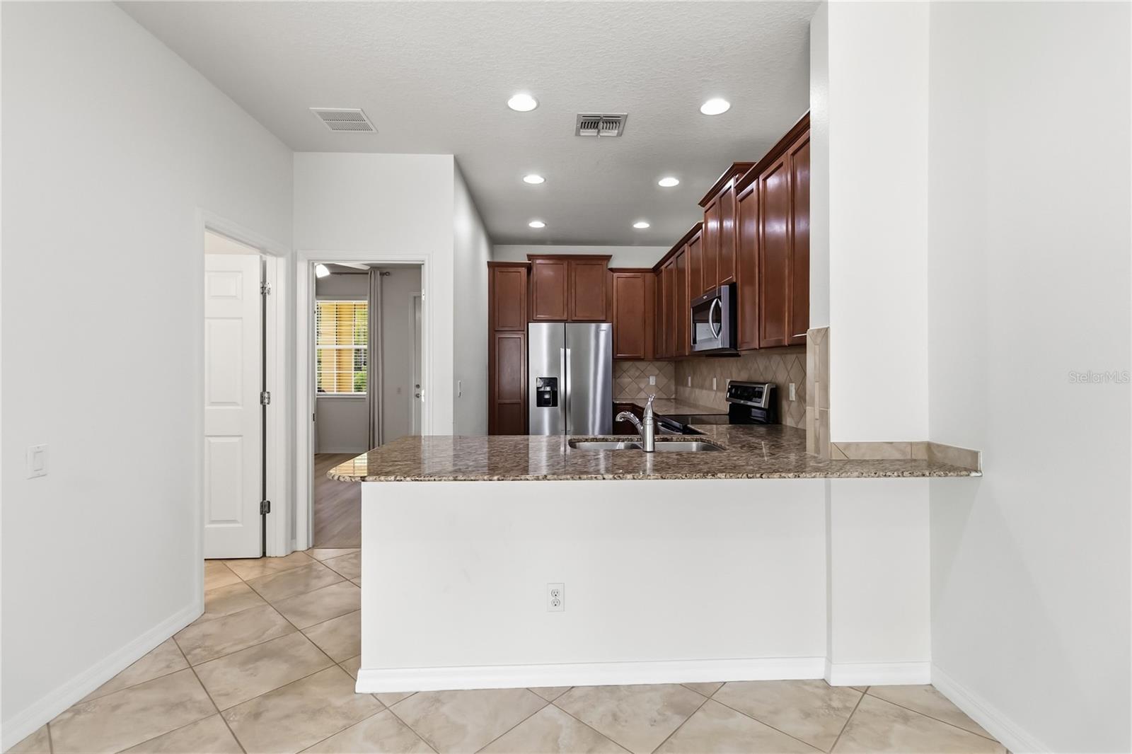 8681 LOWER VILLAGEWALK CIR, ORLANDO, FL — photo 20