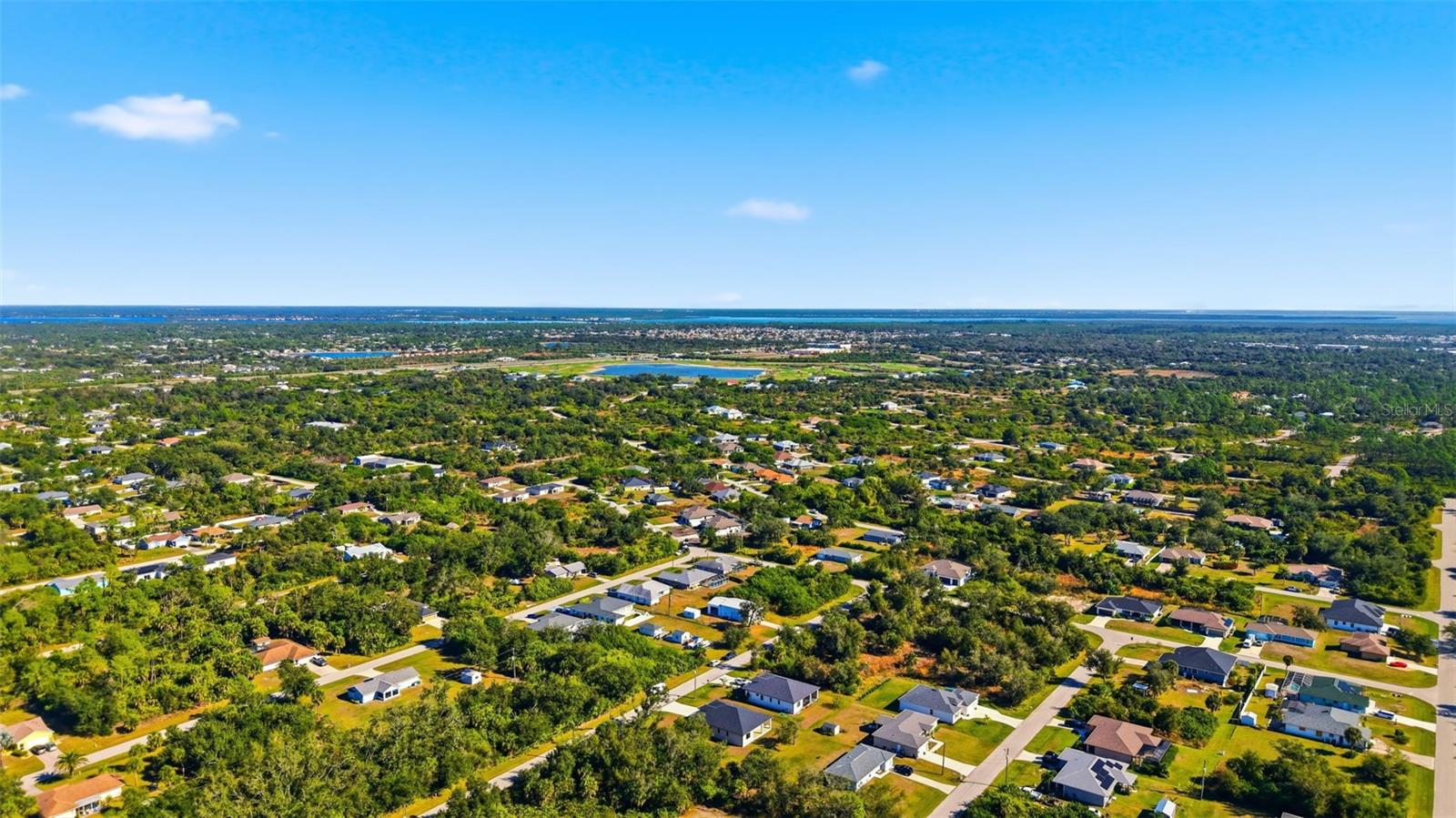 12005 CARNIVAL AVE, PORT CHARLOTTE, FL — photo 46