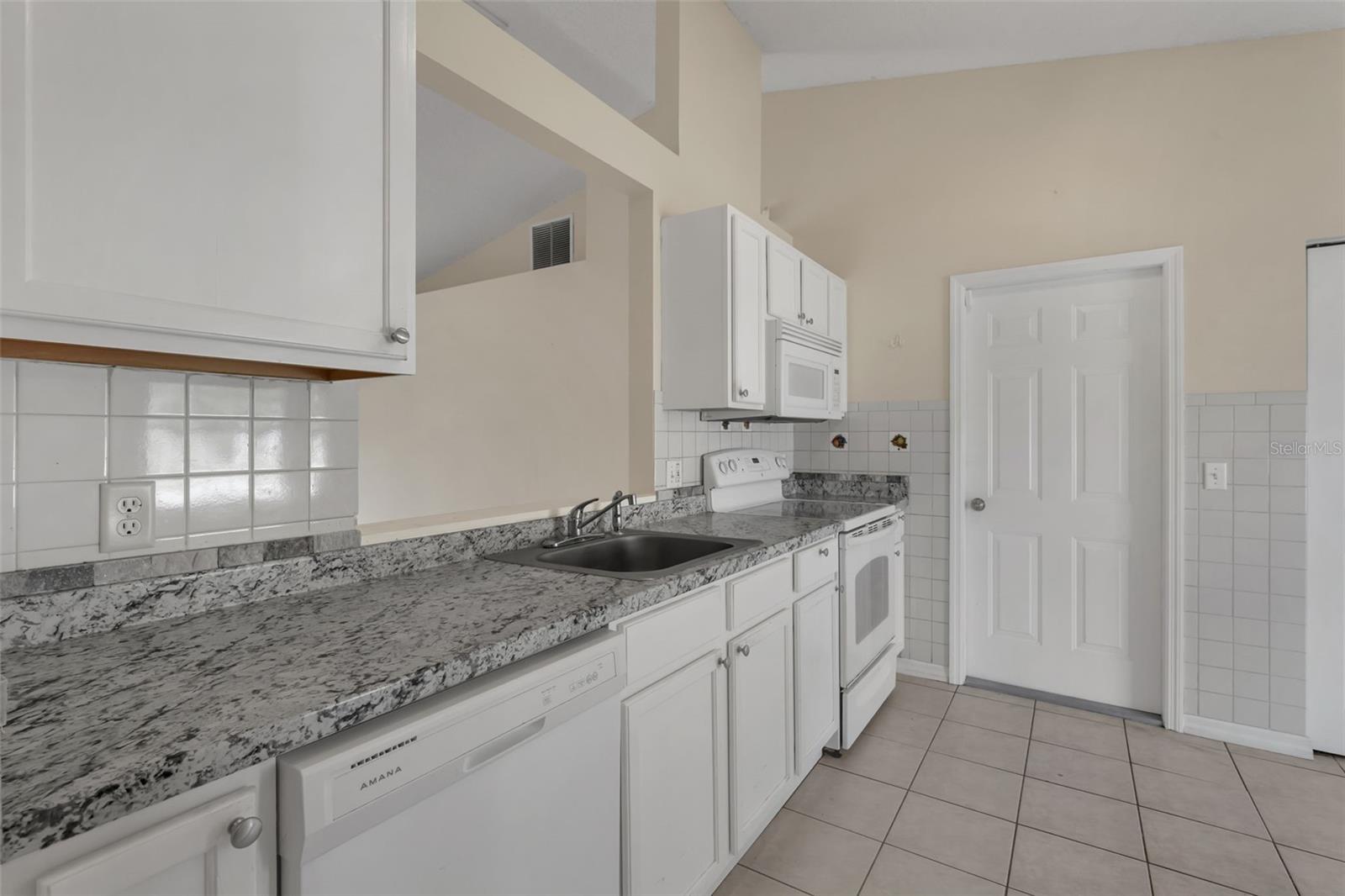 36 PINE HILL LN, PALM COAST, FL — photo 11