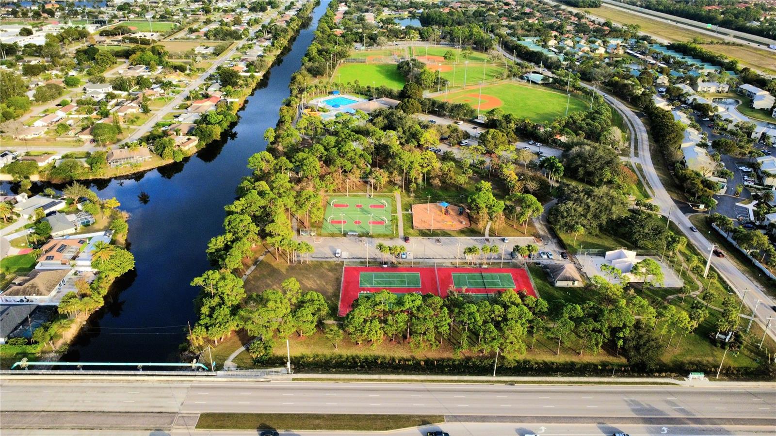 1448 CHURCHILL CIR #S103, NAPLES, FL — photo 33