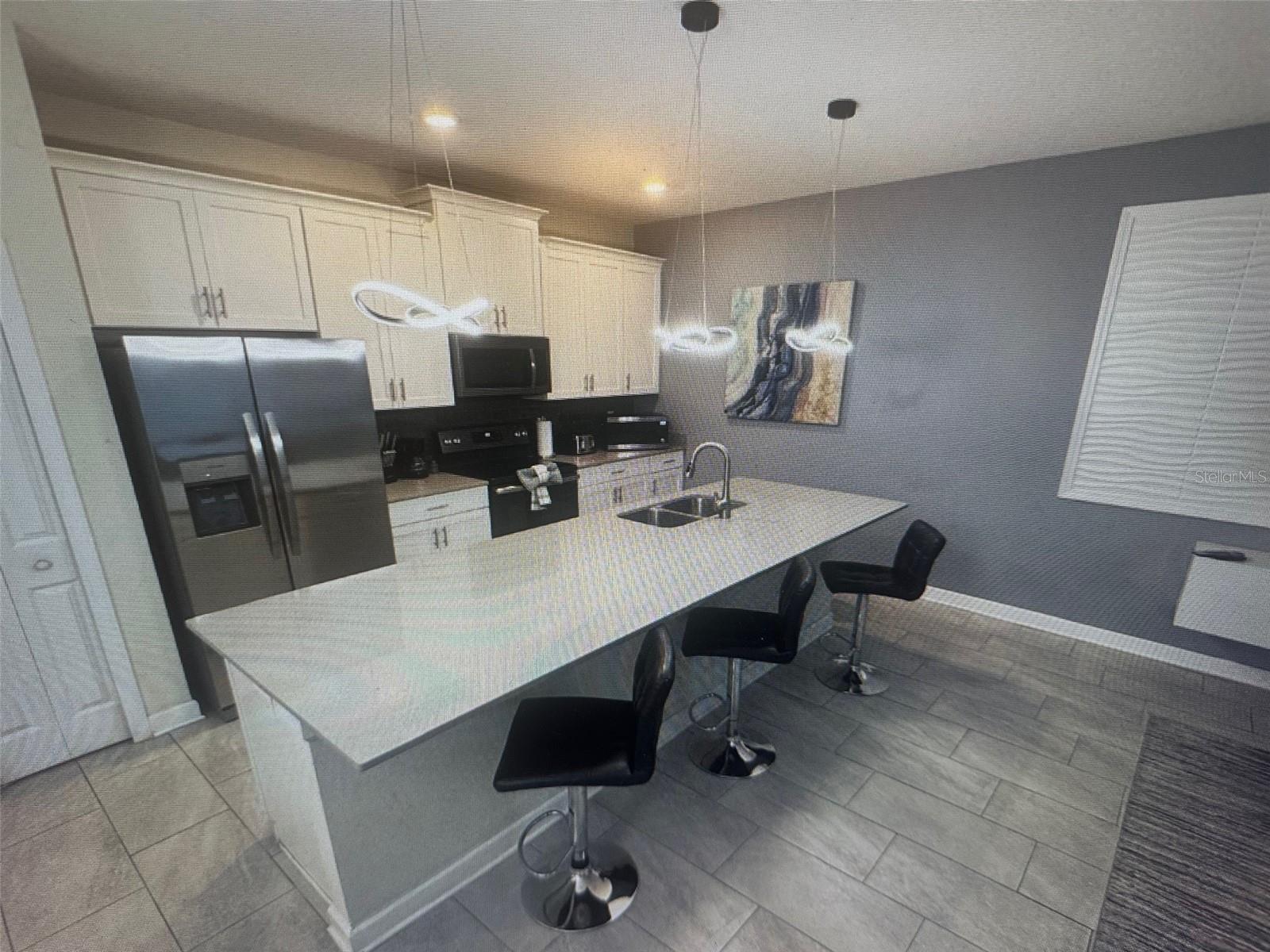 4976 WINDERMERE AVE, KISSIMMEE, FL — photo 2