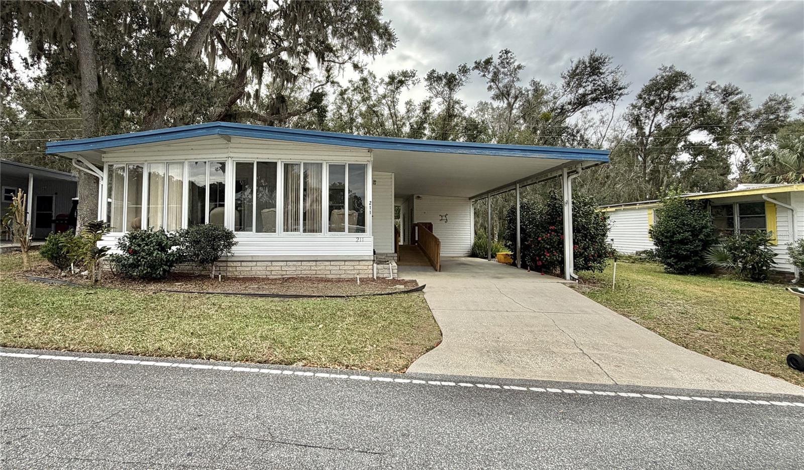 211 ASPEN CIR, LEESBURG, FL