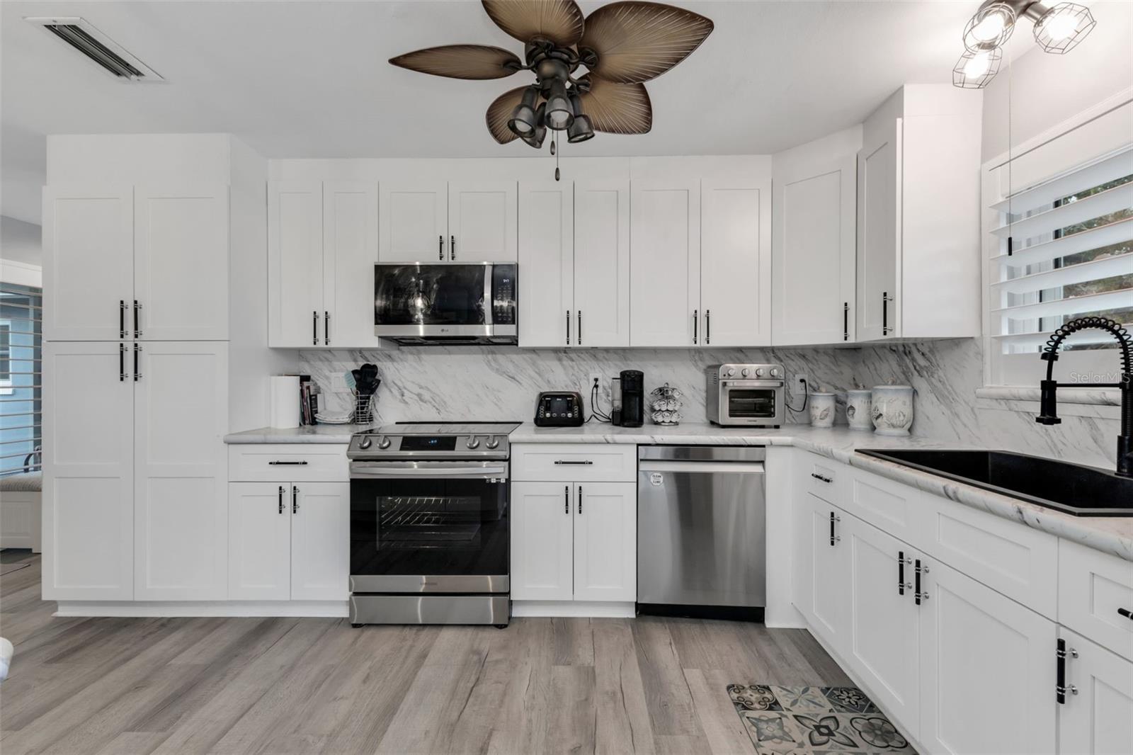 16 OAKLAND HILLS PL, ROTONDA WEST, FL — photo 10