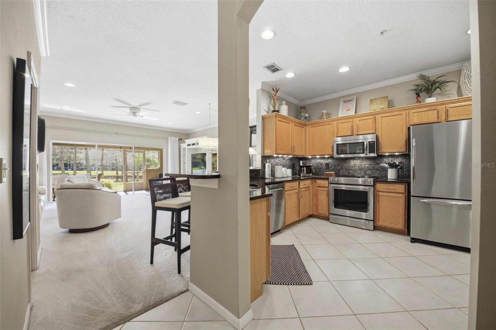 11125 KAPOK GRAND CIR, MADEIRA BEACH, FL — photo 6
