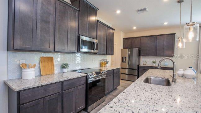 6466 CHORUS DR, MASCOTTE, FL — photo 14
