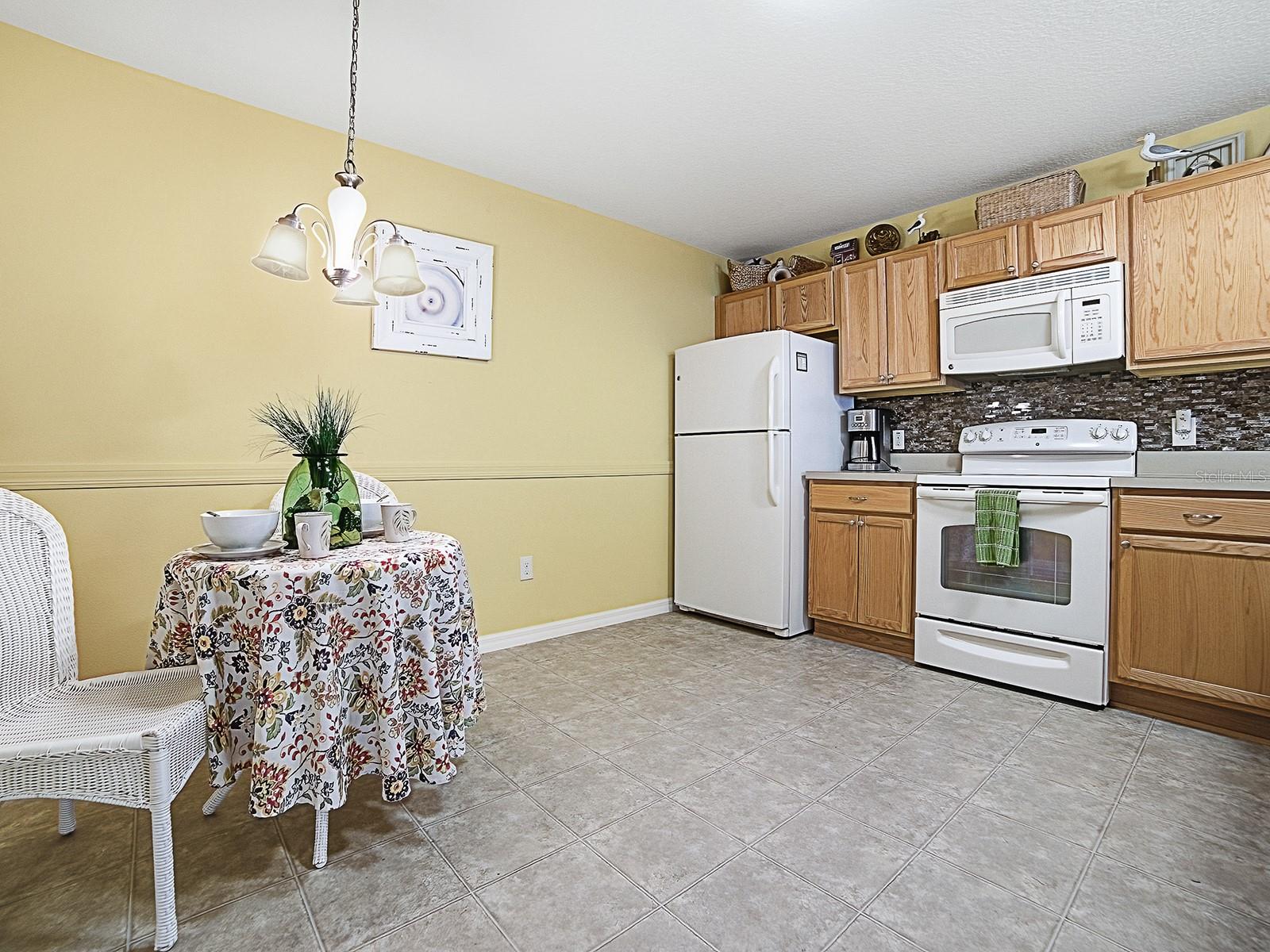 1692 INDIGO AVE, THE VILLAGES, FL — photo 21