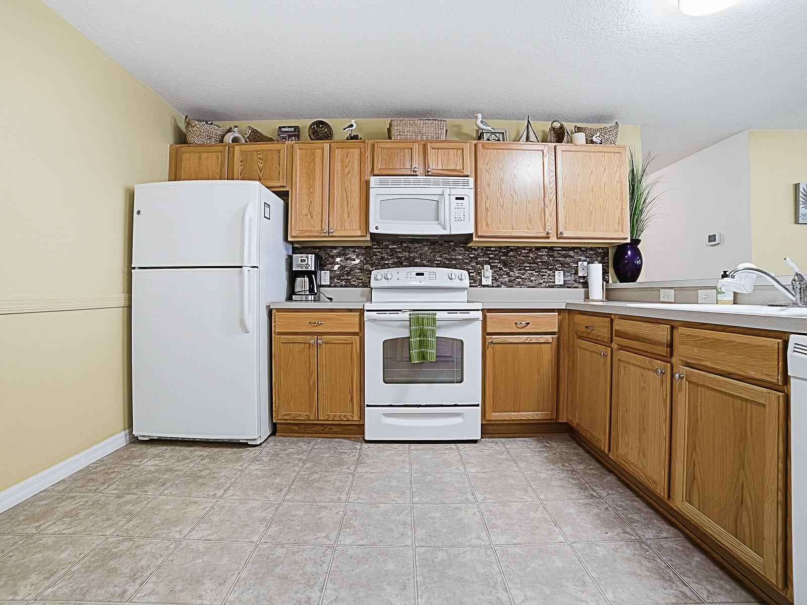 1692 INDIGO AVE, THE VILLAGES, FL — photo 22
