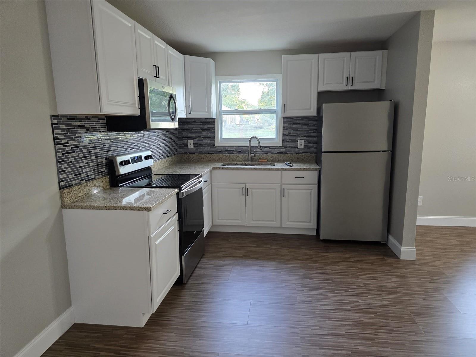 11548 MISSOURI ST, LEESBURG, FL — photo 33