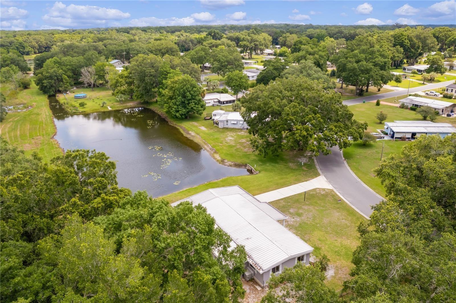 302 IVANHOE CIR, LADY LAKE, FL — photo 4