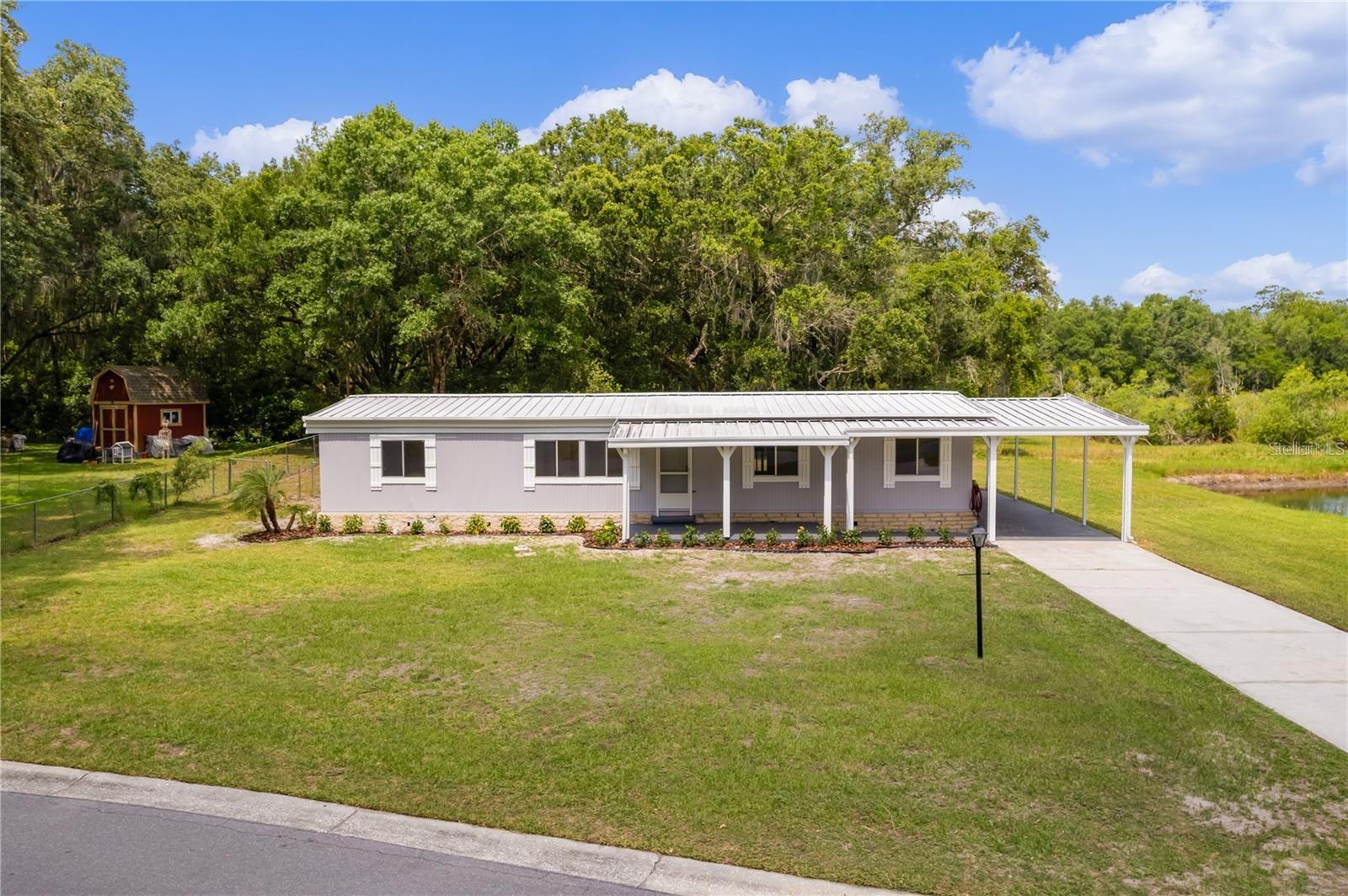 302 IVANHOE CIR, LADY LAKE, FL — photo 61